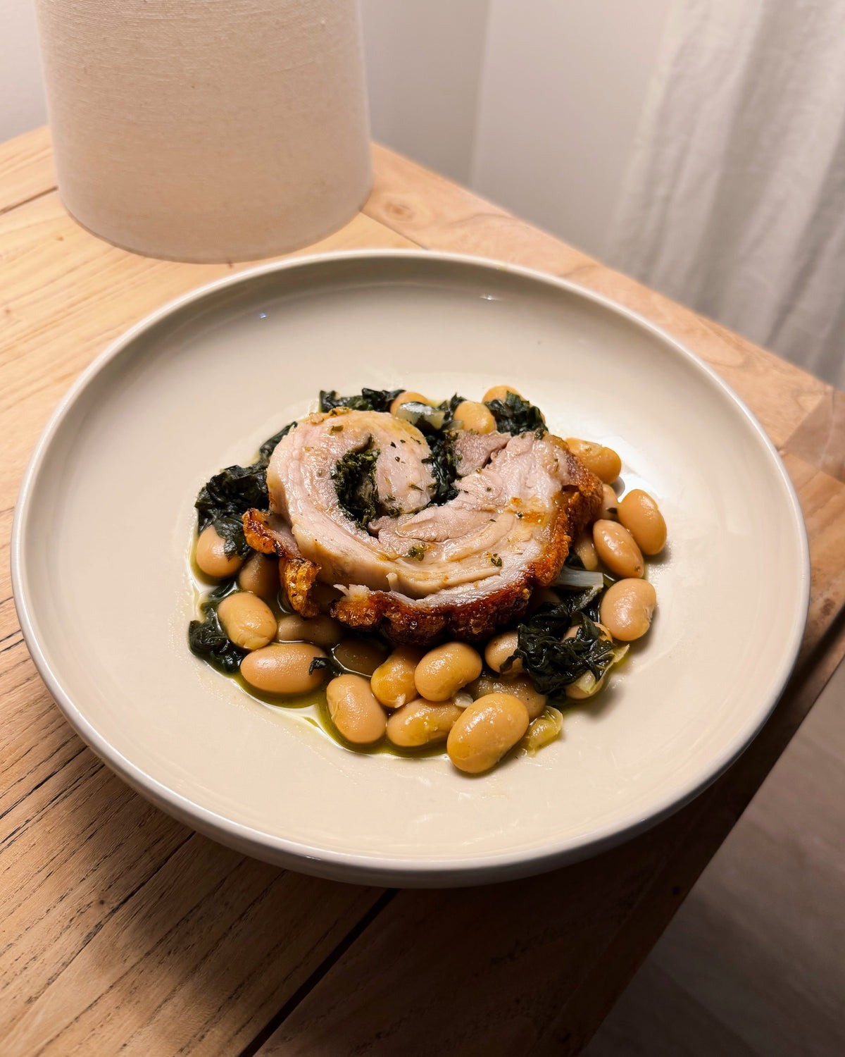 Herb-Rubbed Porchetta with Butter Beans